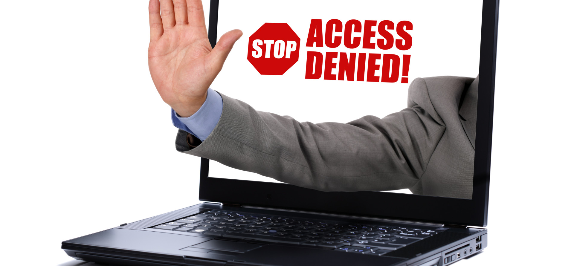 a man's hand extending from a laptop signally you to stop. 